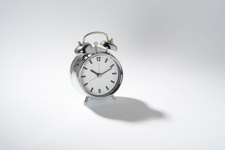 Classic alarm clock, of gray color with bells
