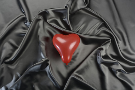 Fabric gray heart shaped balloonの写真素材