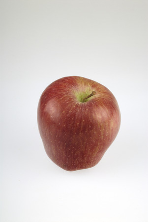 a red apple on white backgroundの写真素材