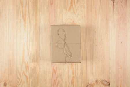 Box ready for shipping on wooden floor