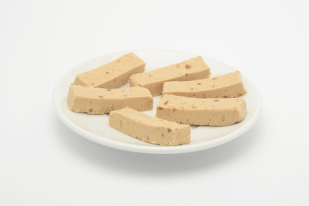Soft almond nougat on white backgroundの写真素材