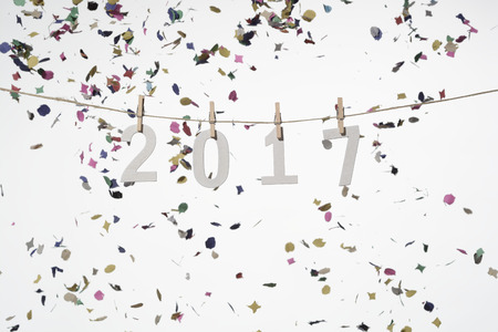 2017 written in wooden letters hanging from a rope, New Yearの写真素材
