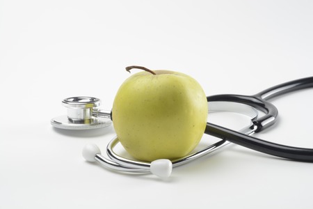 Stethoscope and appleの写真素材