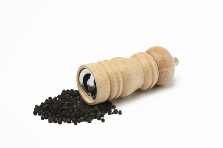 Pepper mill and black pepperの写真素材