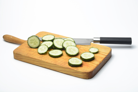 Sliced ??cucumbers in a kitchen tableの写真素材