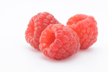 Raspberries on a white background, fruit