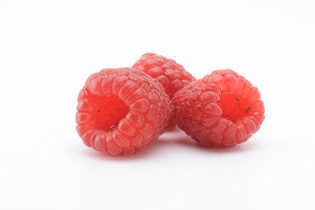 Raspberries on a white background, fruit