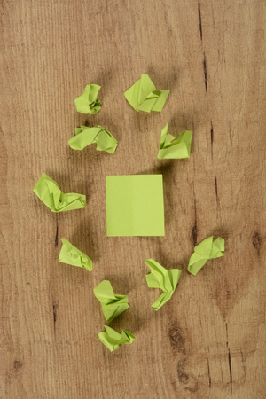 Crumpled paper notes with a smooth, color greenの写真素材