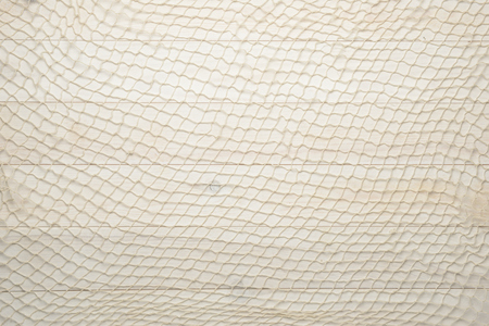 Red fishing net on white wooden background, view from aboveの写真素材