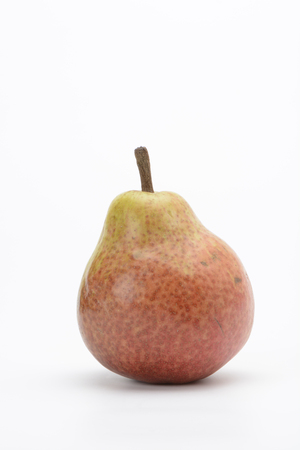 One red pear on white backgroundの写真素材