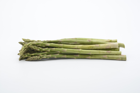 Raw asparagus on white backgroundの写真素材