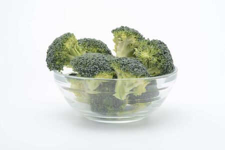A raw broccoli on white backgroundの写真素材