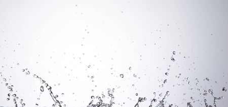 Moving water on white backgroundの写真素材