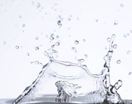 Moving water on white backgroundの写真素材