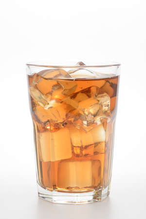 Glass of ice tea on white backgroundの写真素材