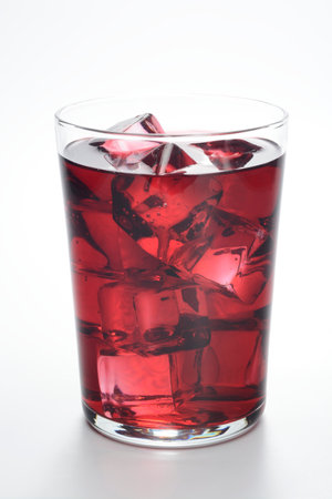 Glass of wine with ice cubes on white background, isolatedの写真素材