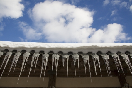 Roof icicle winter landscapeの写真素材