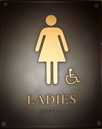 Women bathroom with black backgroundの写真素材