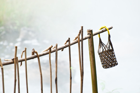 Basket and stick with hot springの写真素材
