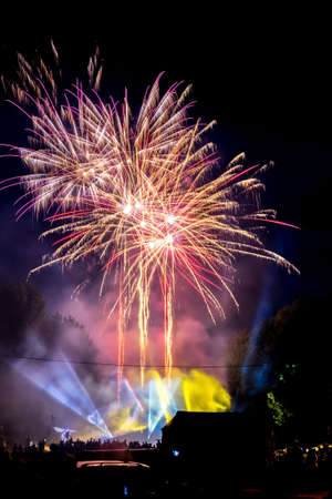 Beautiful colorful firework display over sea on celebration night.の写真素材