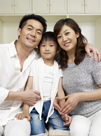 portrait of a family of three の写真素材