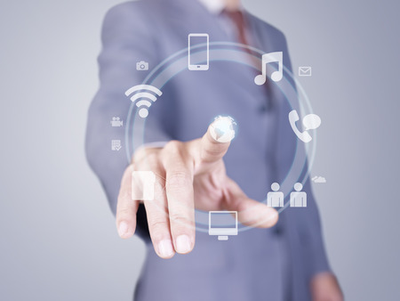 hand of businessman pressing virtual button の写真素材