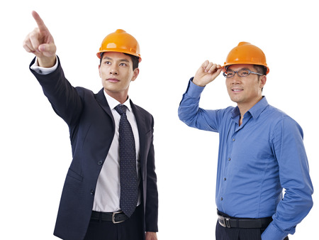 asian businessmen with safety helmet.の写真素材