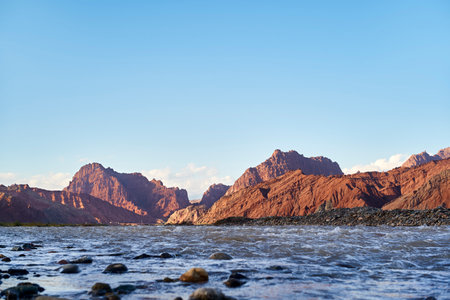 River running out of the Tianshan Mysterious Grand Canyon in Xinjiang, Chinaの写真素材