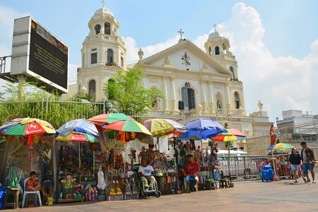 MANILA, PH - OCT. 5: Minor Basilica of the Black Nazarene or also known as Quiapo church facade and market place on October 5, 2019 in Manila, Philippines.のeditorial素材