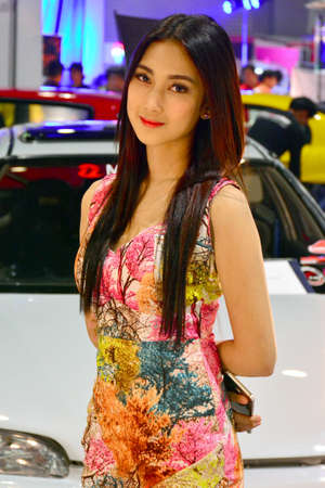PASAY, PH - NOV. 6: Car show female model at Manila Auto Salon on November 6, 2016 in SMX Convention Center, Pasay, Philippines.のeditorial素材