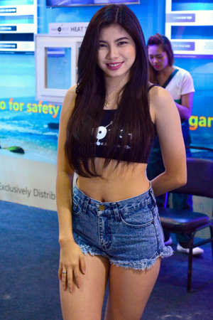 PASAY, PH - NOV. 6: Car show female model at Manila Auto Salon on November 6, 2016 in SMX Convention Center, Pasay, Philippines.のeditorial素材