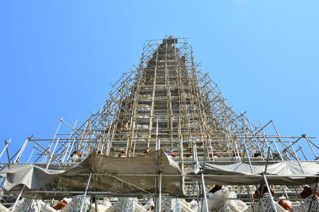 BANGKOK, TH - DEC. 12: Wat Arun central tower facade on December 12, 2016 in Bangkok, Thailand. Wat Arun or Temple of Dawn is a Buddhist temple in Bangkok, Thailand.のeditorial素材