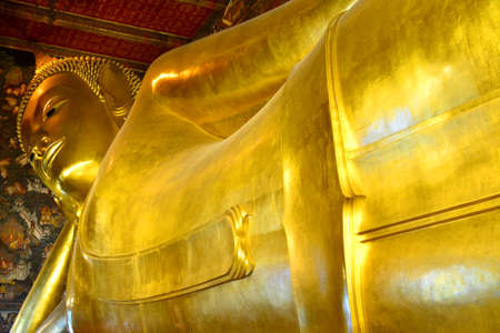 BANGKOK, TH - DEC. 12: Reclining Buddha at Wat Pho on December 12, 2016 in Bangkok, Thailand. Wat Pho is a Buddhist temple complex in the Phra Nakhon District, Bangkok, Thailand.のeditorial素材