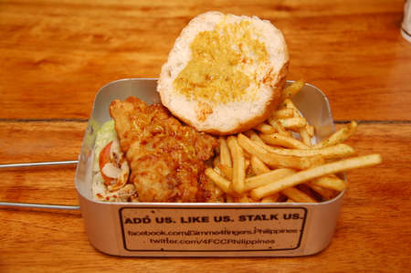 MANILA, PH - DEC. 29: Four Fingers crispy chicken burger meal on December 29, 2018 in Manila, Philippines. Four Fingers brand is a fast food chain with branches in Australia and South East Asia.のeditorial素材