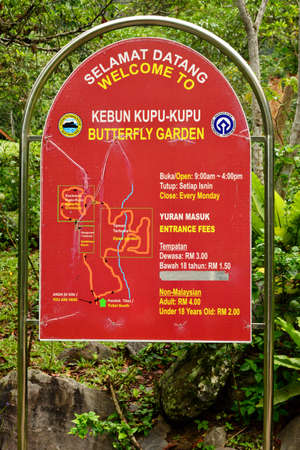 SABAH, MY - JUNE 18: Poring Hot Spring butterfly garden sign on June 18, 2016 in Sabah, Malaysia. Poring is situated in lowland rainforest, contrasting with the montane and submontane rainforest of Kinabalu National Park.のeditorial素材