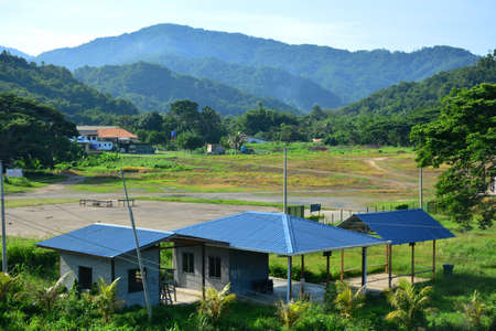 SABAH, MY - JUNE 18: Tamparuli town with surrounding trees and mountains on June 18, 2016 in Sabah, Malaysia.のeditorial素材