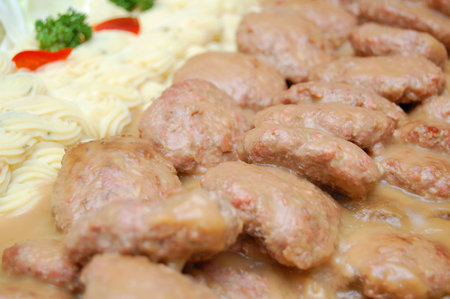 Salisbury beef steak with mashed potato as part of the meal