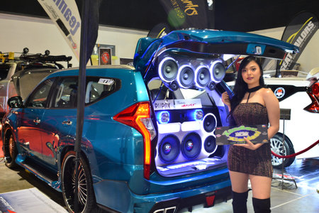 PASAY, PH - JULY 28: Car show female model with Mitsubishi montero at Bumper to Bumper prime car...