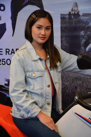 PASAY, PH - JUNE 16 - Motorcycle female model at Makina Moto show on June 16, 2019 in Pasay,...