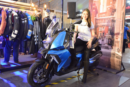PASAY, PH - MARCH 24 - BMW motorrad motorcycle female model at Inside Racing Motor Bike Show on...