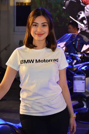 PASAY, PH - MARCH 24 - BMW motorrad motorcycle female model at Inside Racing Motor Bike Show on March 24, 2019 in Pasay, Philippines.のeditorial素材