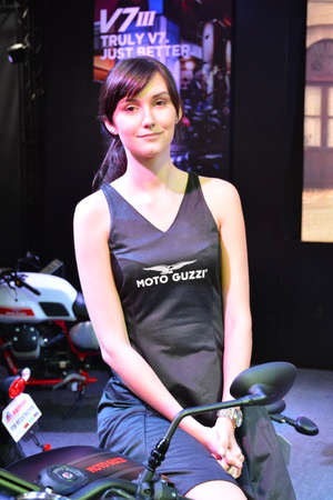 PASAY, PH - MARCH 24 - Moto Guzzi female model at Inside Racing Motor Bike Show on March 24, 2019 in Pasay, Philippines.のeditorial素材