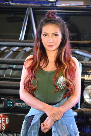 PASAY, PH - NOV 30 - 4 x 4 Rugged Rigs female model at Manila Auto Salon car show on November 30, 2018 in Pasay, Philippines.のeditorial素材