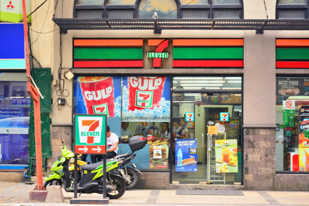 MANILA, PH - OCT 7 - 7 Eleven convenient store facade and sign on October 7, 2017 in Manila,...