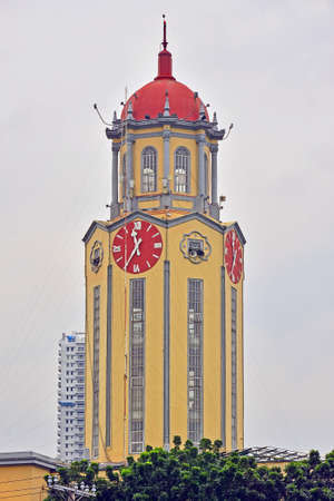 MANILA, PH - OCT 7 - Manila City Hall clock tower on October 7, 2017 in Manila, Philippines. Manila City Hall Clock Tower has hexagonal shaped tower has one red-faced clock placed on its three facets.のeditorial素材