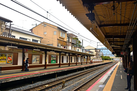 KYOTO, JP - APRIL 10 - Japan Railways Uzumasa station train rail tracks on April 10, 2017 in Kyoto, Japan.のeditorial素材