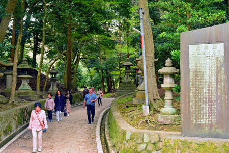 KYOTO, JP - APRIL 10 - Fushimi Inari Taisha path way on April 10, 2017 in Kyoto, Japan. Fushimi Inari was dedicated to the gods of rice and sake by the Hata family in the 8th century.のeditorial素材
