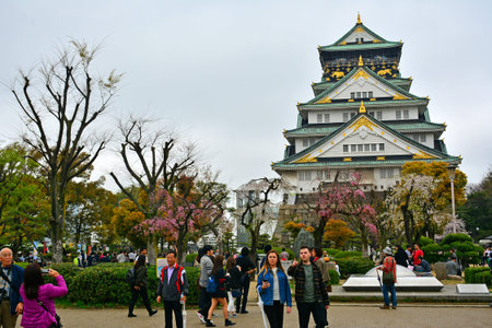 OSAKA, JP - APRIL 8 - Osaka Castle facade on April 8, 2017 in Osaka, Japan. Osaka Castle is one of the most famous landmarks and it played a role in the unification of Japan during 16th century.のeditorial素材
