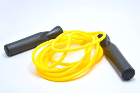 Yellow plastic sports jumping rope use for exercise activityの写真素材