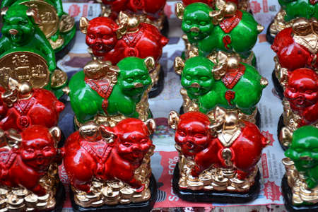 Pig statues lucky charm display figurines as part of Chinese beliefのeditorial素材